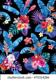 Seamless pattern with palm leaves and tropical flowers. Vector illustration.