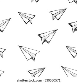 Seamless pattern with a paper airplane on a white background . Drawing by hand . Line drawing. Doodle