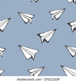 Seamless pattern with a paper airplane on a white background . Drawing by hand . Line drawing. Doodle vector illustration
