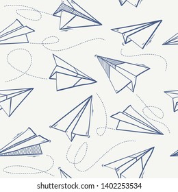 Seamless pattern of paper airplane.Paper airplanes flying on blue sky 