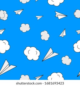 seamless pattern with paper airplanes and clouds on blue background