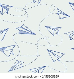 Seamless pattern of Paper airplanes on paper background