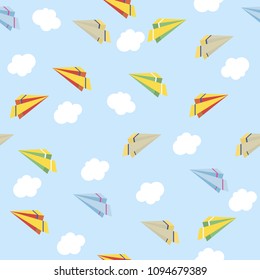 Seamless pattern of paper planes on a blue background. vector illustration