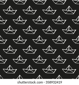 Seamless pattern with paper ships. Hand drawn background.