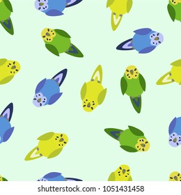 Seamless pattern with parrots.
Summer vector background with parrots.Budgerigar australian parakeet. 
Small cute melopsittacus