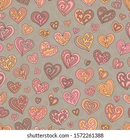 Seamless Pattern of Pastel Beige, Brown, Orange, Pink, Yellow Doodles Hearts. Continuous Hand-drawn Background for Cloth, Fabric, Textile, Tissue, Pack Paper, Wrapping Paper.