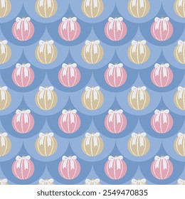Seamless pattern with pastel Christmas ornaments tied with bows on blue background. Vector hand drawn illustration for wrapping, fabrics, wallpaper and decoration