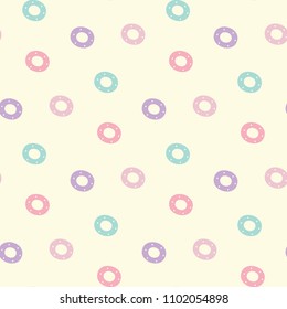 Seamless Pattern with Pastel Circle and Dot Design on Pale Yellow Background