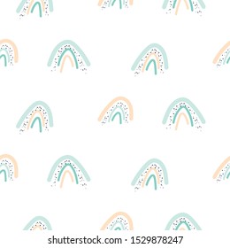 Seamless pattern with pastel color rainbow shapes. Light pink and mint cute hand drawn texture.