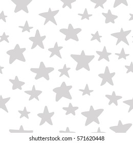 Seamless pattern with pastel gray hand drawn stars on white background. Sky background. Cute wrapping paper. Vector illustration.