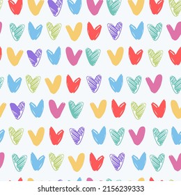 Seamless pattern with pastel rainbow-colored hearts. LGBT concept