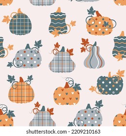 Seamless pattern with patchwork pumpkins with different prints on them. Vector illustration.