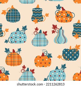 Seamless pattern with patchwork pumpkins with different prints on them. Vector illustration.