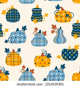 Seamless pattern with patchwork pumpkins with different prints on them. Vector illustration.