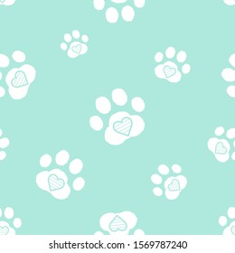 Seamless pattern with paw prints and heart  on mint background. Flat design vector illustration.