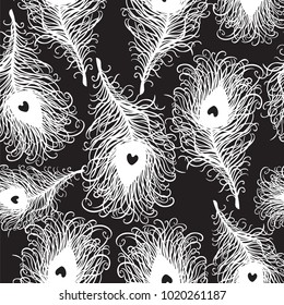 Seamless pattern of peacock feathers in art deco style