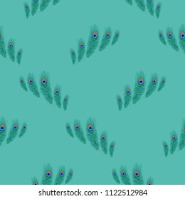 Seamless pattern of peacock feathers on a turquoise background