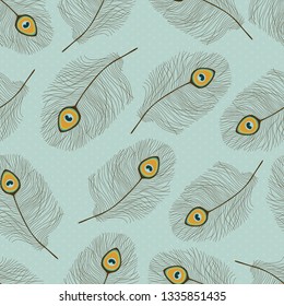 Seamless pattern with peacock feathers on blue background