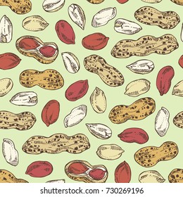 Seamless pattern with peanut: nuts and leaves. Vector hand drawn illustration.