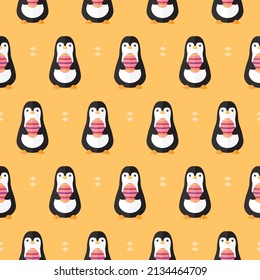 seamless pattern penguin animal with Easter egg holidays on yellow background vector wallpaper textile giftwrap