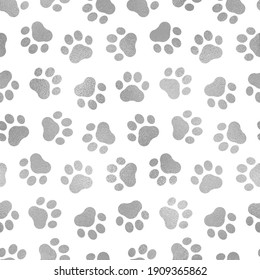 Seamless pattern pet prints. Paw patterns with foil effect. Cute silver marble background. Repeated delicate texture. Glitter patterns. Repeating elegant abstract design pets dog, cat. Vector