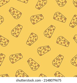Seamless pattern and pieces of cheese on a yellow background
