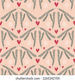 Seamless pattern of pine leaves and hearts on a pink background. Great for textile print, holiday invitations, wrapping paper, or packaging. Vector file.