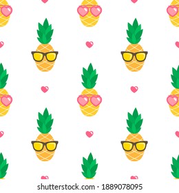 Seamless pattern with pineapples and hearts