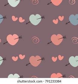 
Seamless pattern with pink and blue hearts with an arrow vector illustration