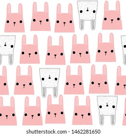Seamless pattern with pink bunny portrait. Funny kids print. Vector hand drawn illustration.