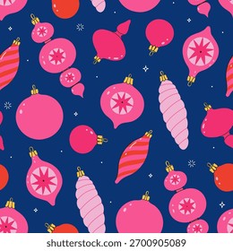 Seamless pattern with pink Christmas ornaments on a blue background. Vector graphics.