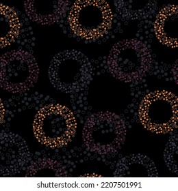 Seamless pattern with pink circles.  Black background. Seamless vector illustration with pink and purple geometric shapes.