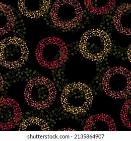 Seamless pattern with pink circles. The Memphis style. Geometrical figure. Seamless vector illustration with pink and purple geometric shapes.