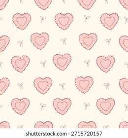 Patrón sin fisuras con corazones decorativos rosados y Pequeños lazos sobre un fondo claro. Fondo romántico en estilo doodle para la decoración del regalo.