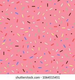 Seamless pattern with pink donuts glaze, Sprinkle Topping, Ice cream Topping. Background with decorative colored sprinkles. Vector illustration.