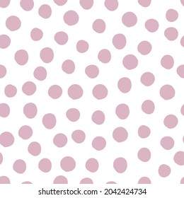 Seamless pattern with pink dots on a white background. Used for wallpaper, paper, fabric and prints.