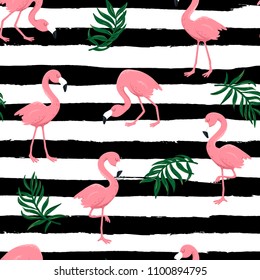 Seamless pattern with pink flamingo birds and tropical leaves. Repeating summer design in the grunge striped background. Trendy exotic print. Vector illustration 