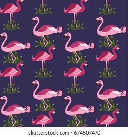 Seamless pattern with Pink Flamingo and green flowers. Dark blue background.