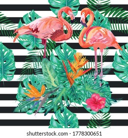 Seamless pattern pink flamingo and hibiscus flower on a black and white geometric background.