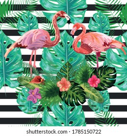 Seamless pattern pink flamingo and hibiscus flower on a black and white geometric background.