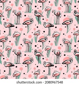 Seamless pattern. Pink flamingo on a pink background with black polka dots. Stylish fashion pattern.