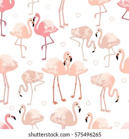 Seamless pattern with pink flamingos 
