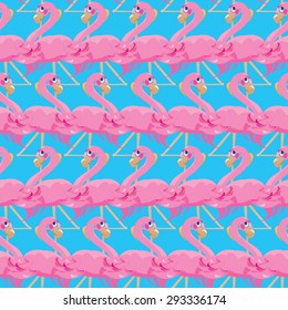 Seamless pattern with pink flamingos on blue background