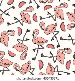 Seamless pattern with pink flamingos and watermelon slices on white background. For summer fabric, wallpaper, wrapping paper and stationery.