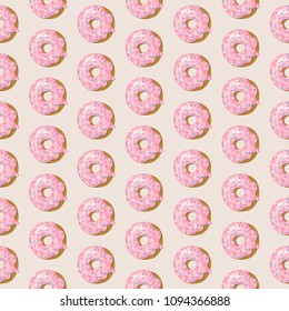 Seamless pattern with pink glazed Donuts. Vector template. Good for fabric, wallpaper, wrap paper, etc.