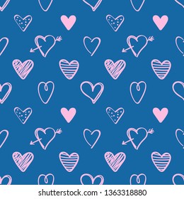 Seamless pattern with pink hand drawn hearts