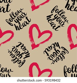 Seamless Pattern from Pink Hearts with lettering Follow your Heart on Grey Background. Hand drawn abstract pattern. May used for Paper Print, Fabric Print. Vector illustration