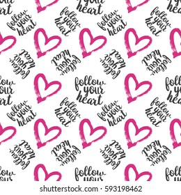 Seamless Pattern from Pink Hearts with lettering Follow your Heart on White Background. Hand drawn abstract pattern. May used for Paper Print, Fabric Print. Vector illustration