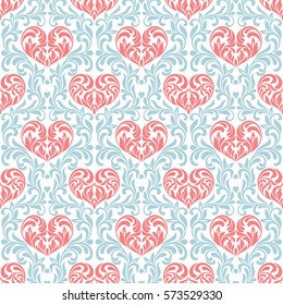 Seamless pattern. Pink hearts made in swirls, leaves and floral elements on a blue floral background 