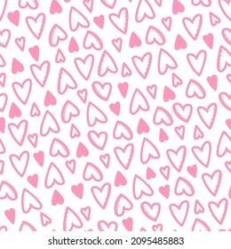Patrón sin foco de corazones rosados sobre un fondo blanco. Uso en el Día de San Valentín en textiles, envolver papel, antecedentes, recuerdos. Vector
